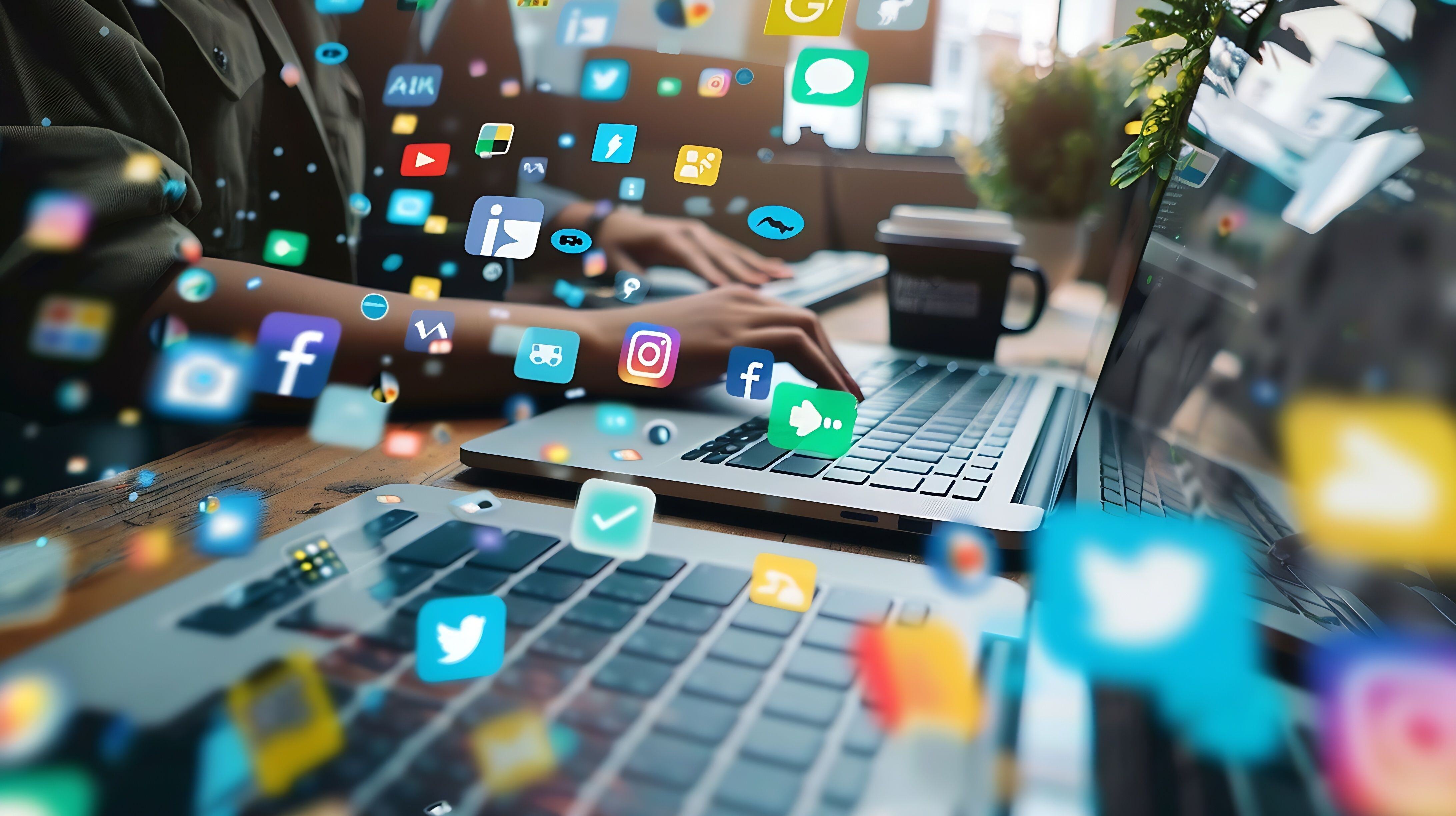 Concept image for Home Service Marketing Strategies: Close up photo of person working at laptop computer with imposed social media icons seeming to fly towards the viewer
