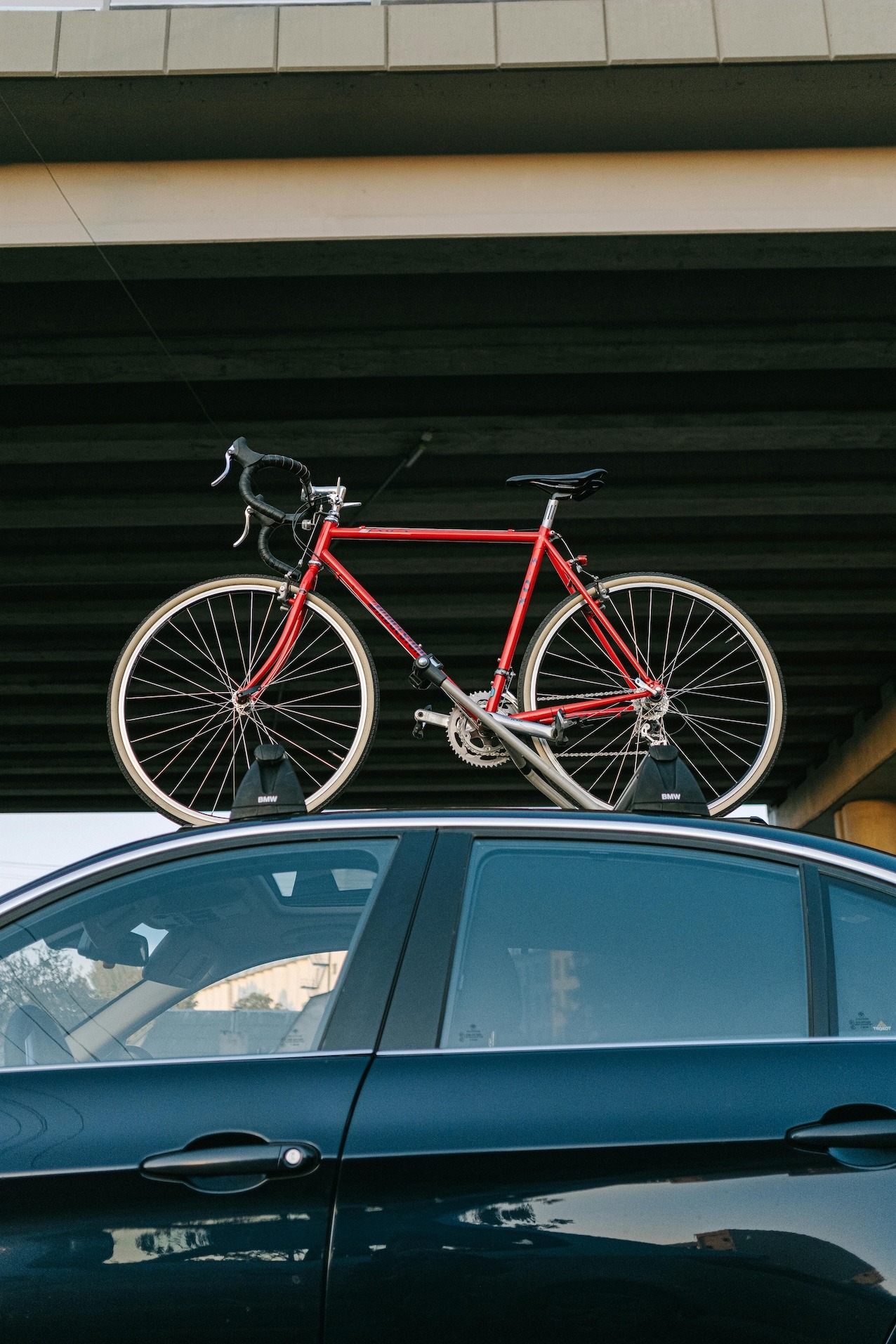 The Best Way to Prepare for a Cycling Adventure, photo of a bike in rack on top of a car