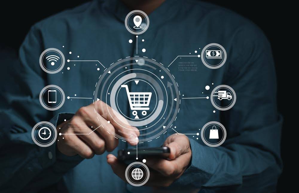 A businessman touch e-commerce and online shopping symbols, signifying the digital transformation of business through technology. Ideal for themes of online marketing, and digital economy.
