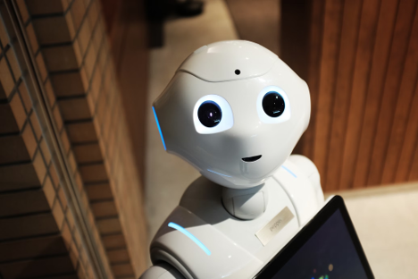 Image of friendly white robot near brown wall source: https://unsplash.com/photos/white-robot-near-brown-wall-2EJCSULRwC8