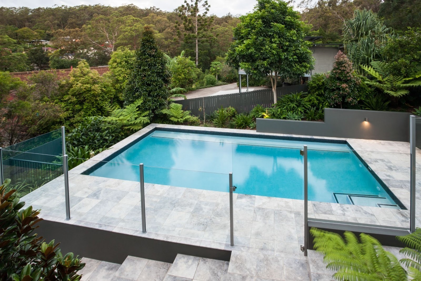 Fenced swimming pool