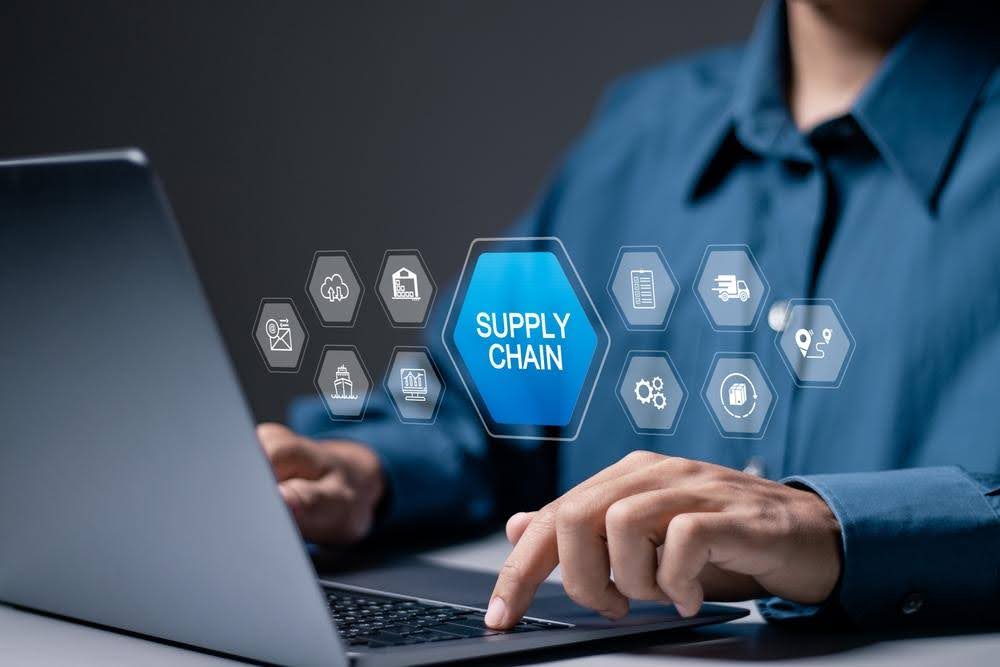 SCM, supply chain management concept, Logistic and transport, organizing and controlling resources to meet the needs of customers. Businessman use laptop with supply chain icon on virtual screen.
