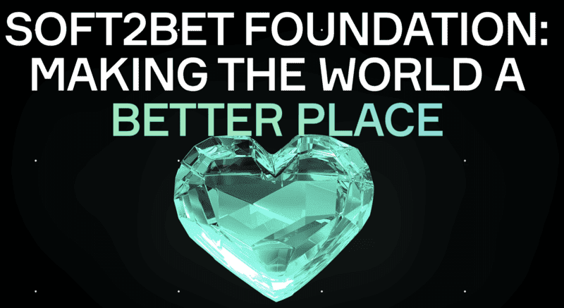 Soft2Bet Foundation logo with crystal heart and the text “Making the World a Better Place