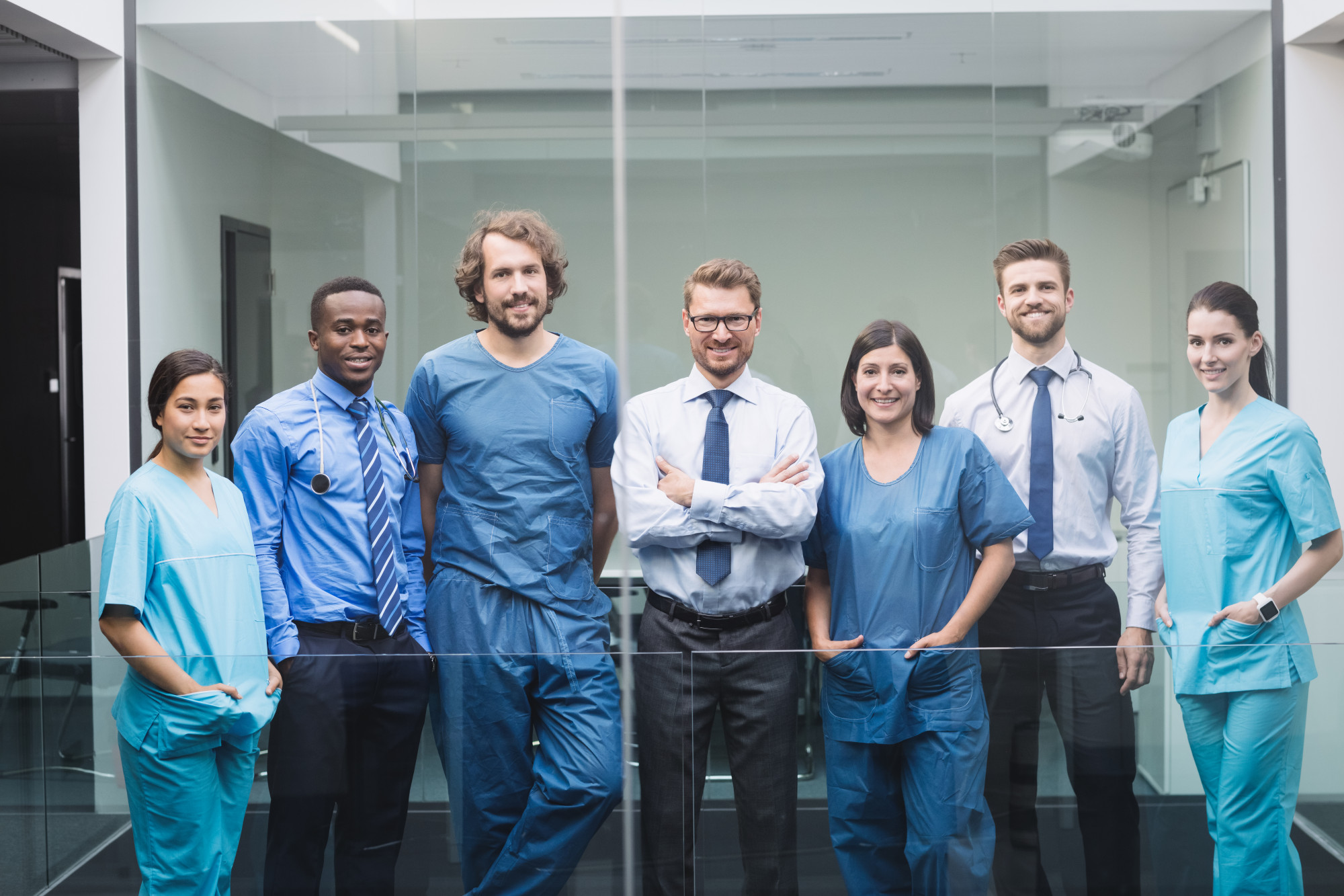 Team of doctors standing in corridor