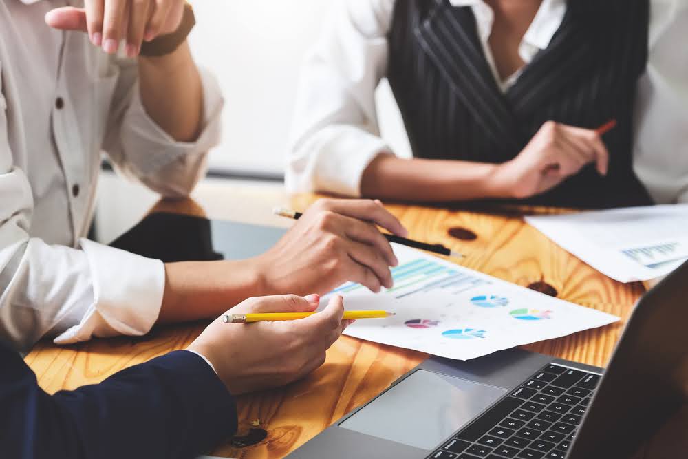 Start-up Business, a team of young entrepreneurs working together to increase profits into the company to increase business potential, vintage effect.