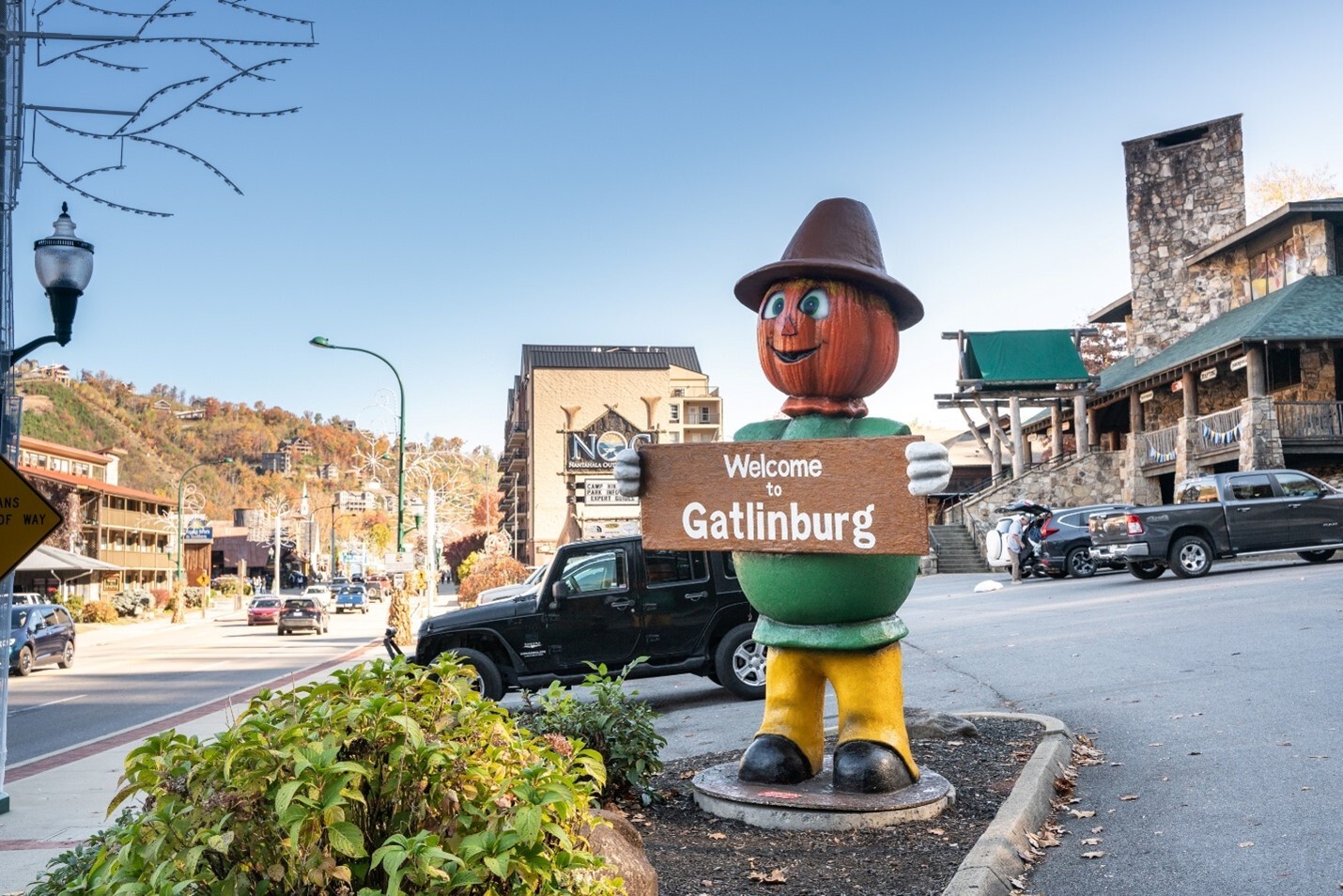 A statue of a pumpkin with a sign

AI-generated content may be incorrect.