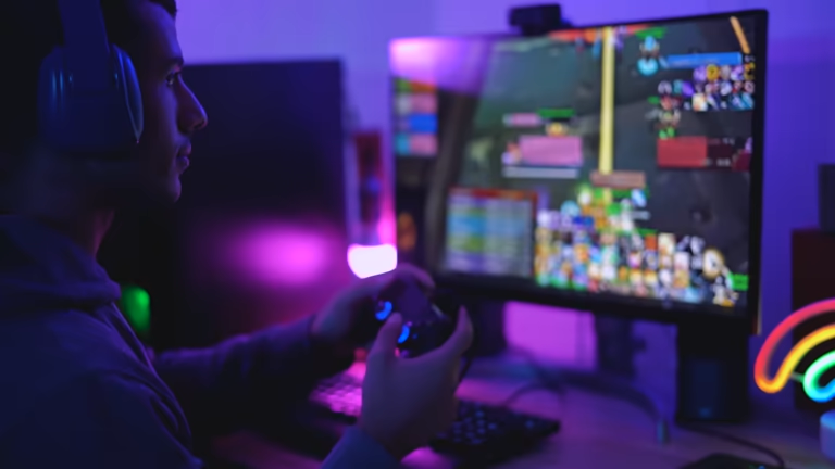 Young gamer playing online video games while streaming on social media