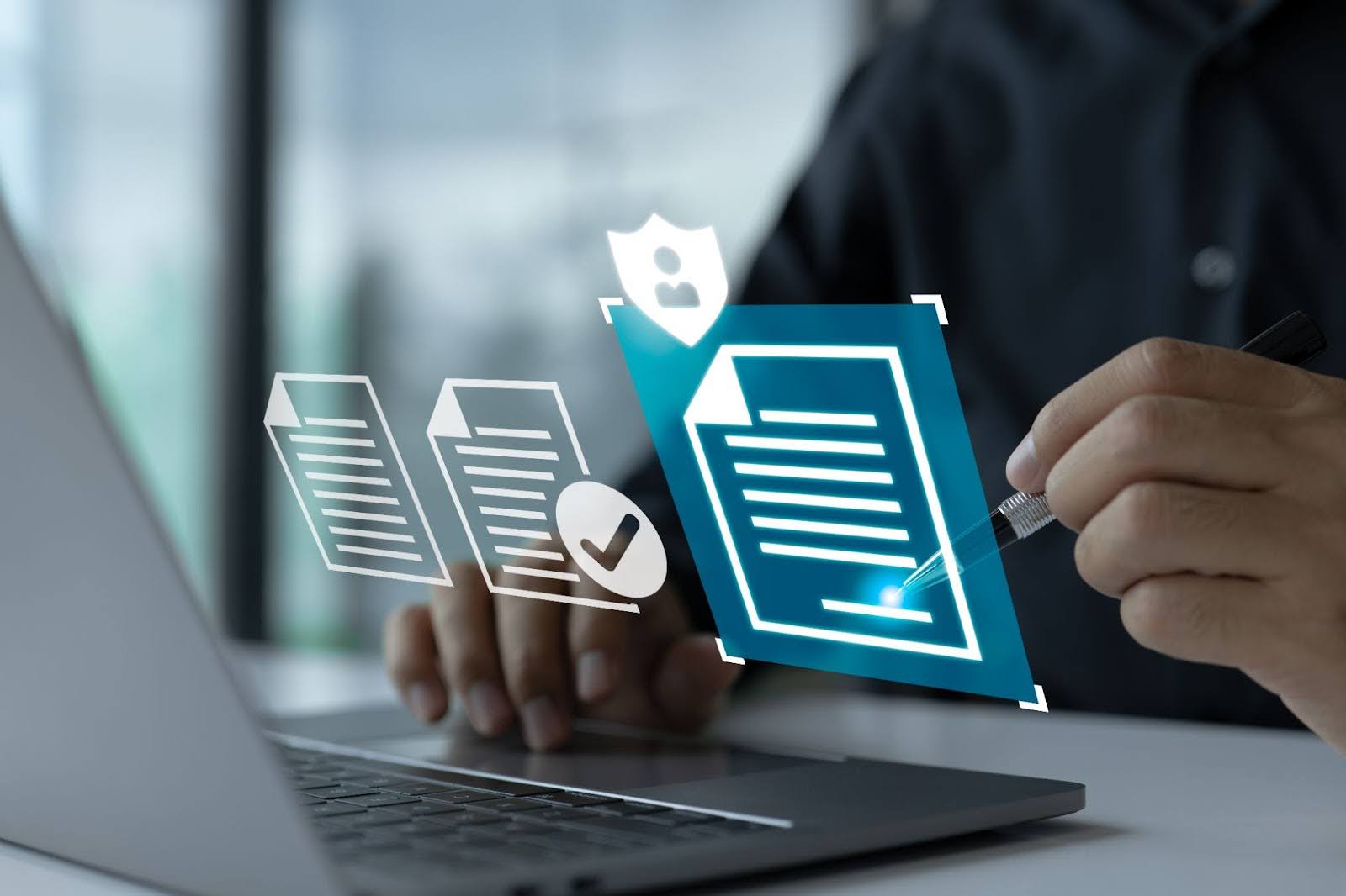 a close up man using laptop with document icon in the middle