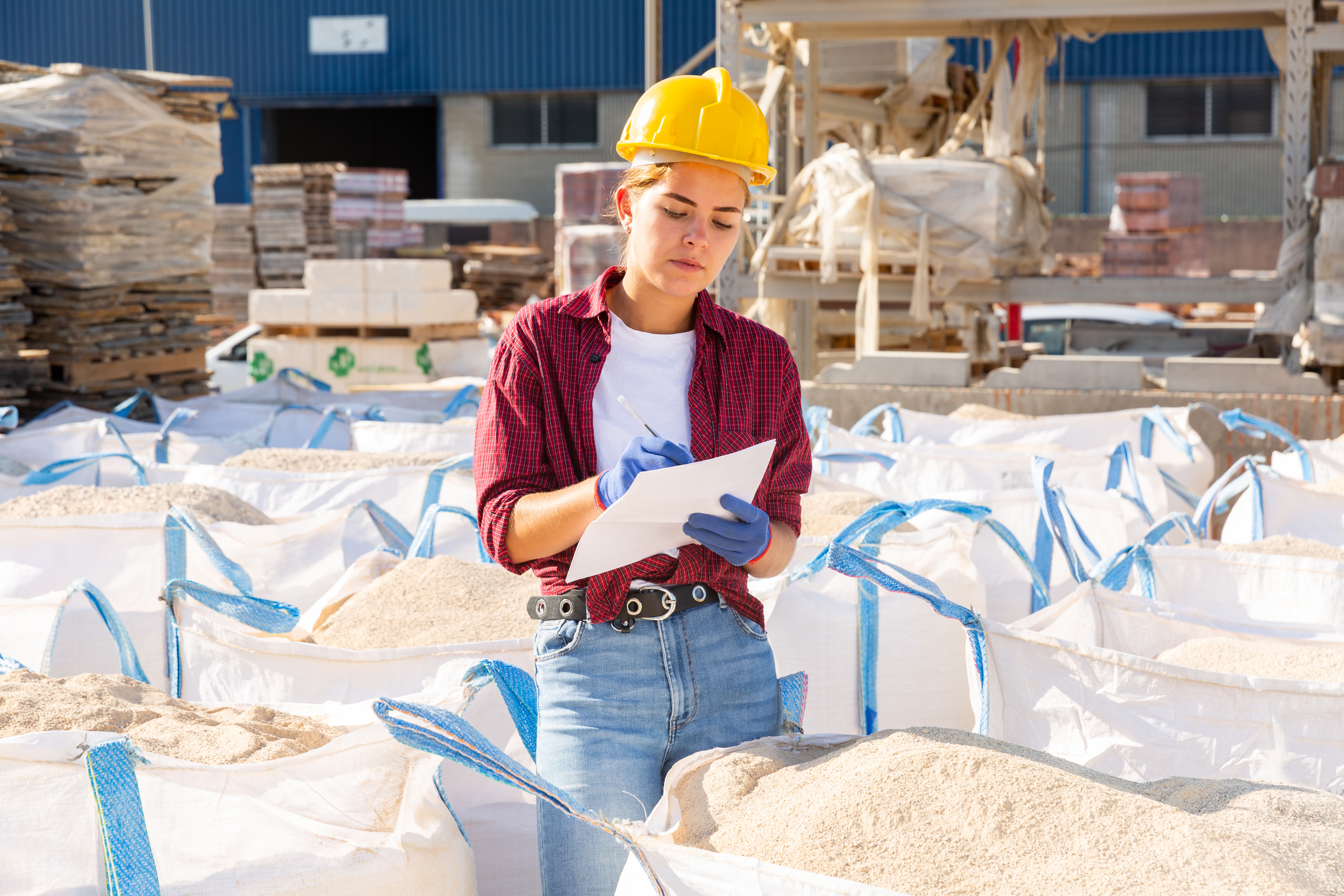 a picture of a woman wearing a construction hat