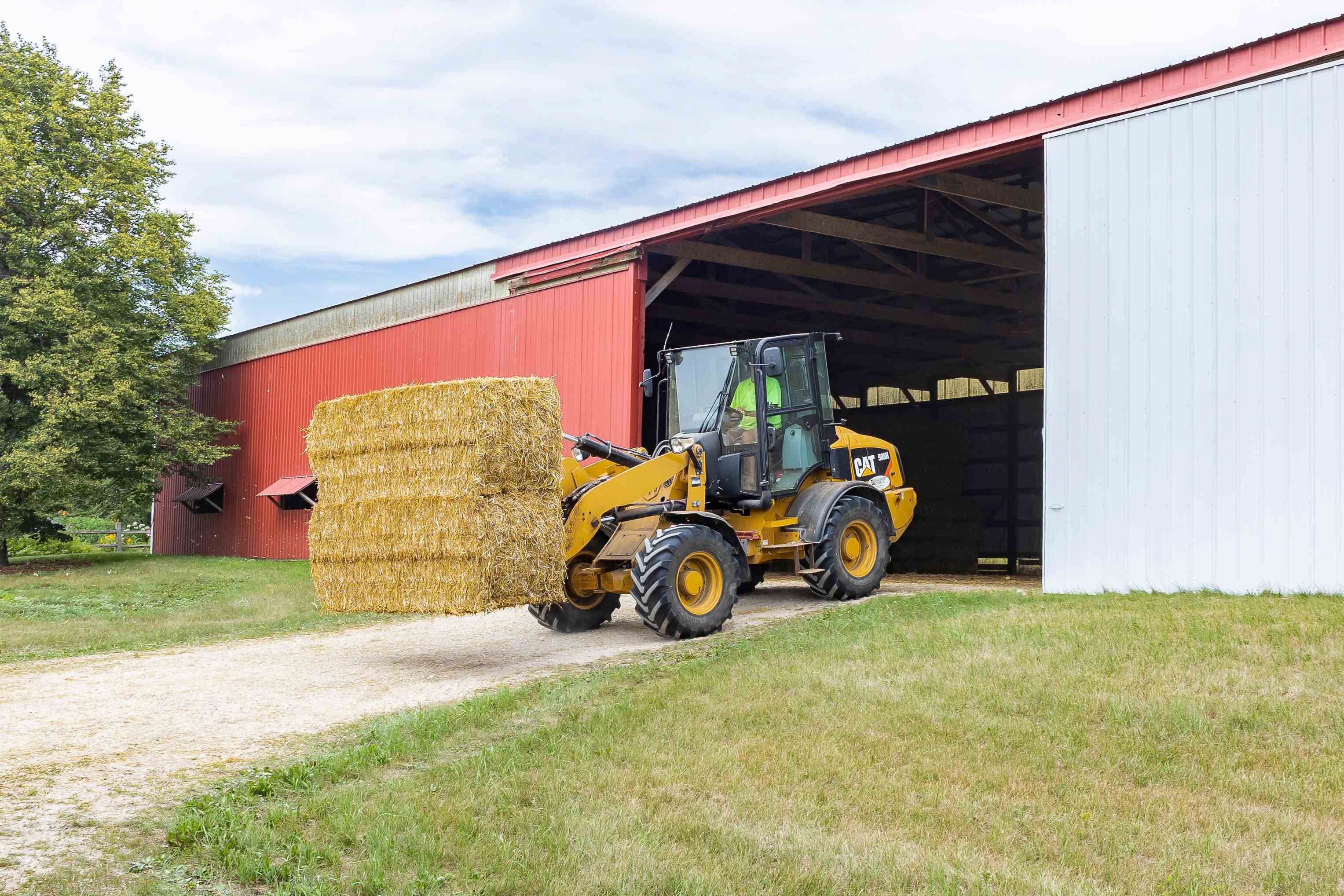 a tractor outside barn