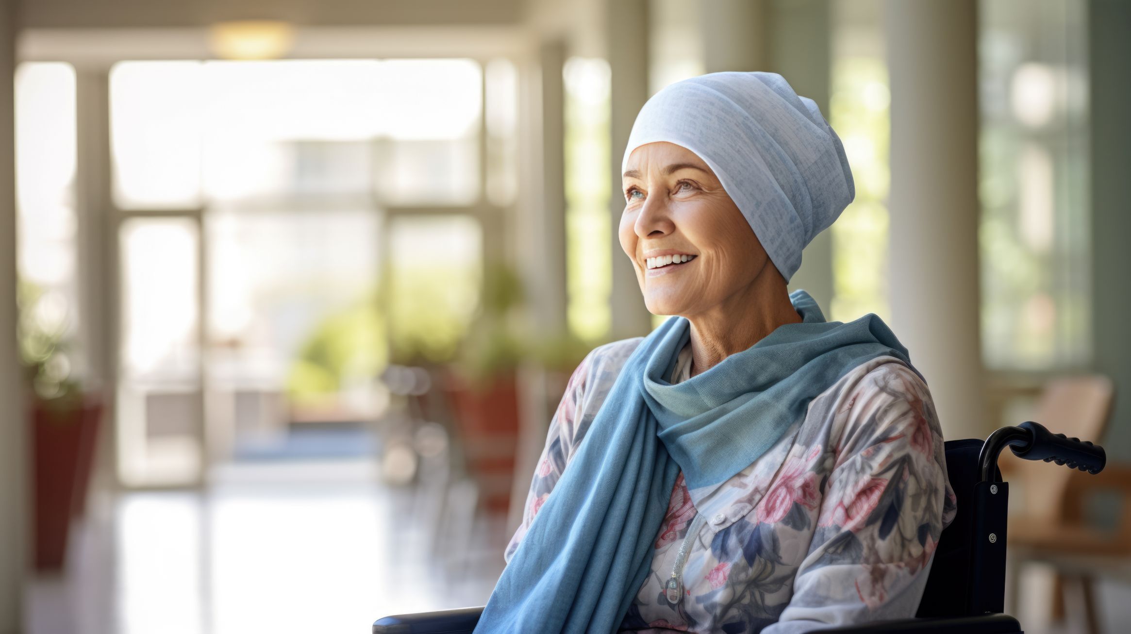 a women sitting in a wheelchair smiling