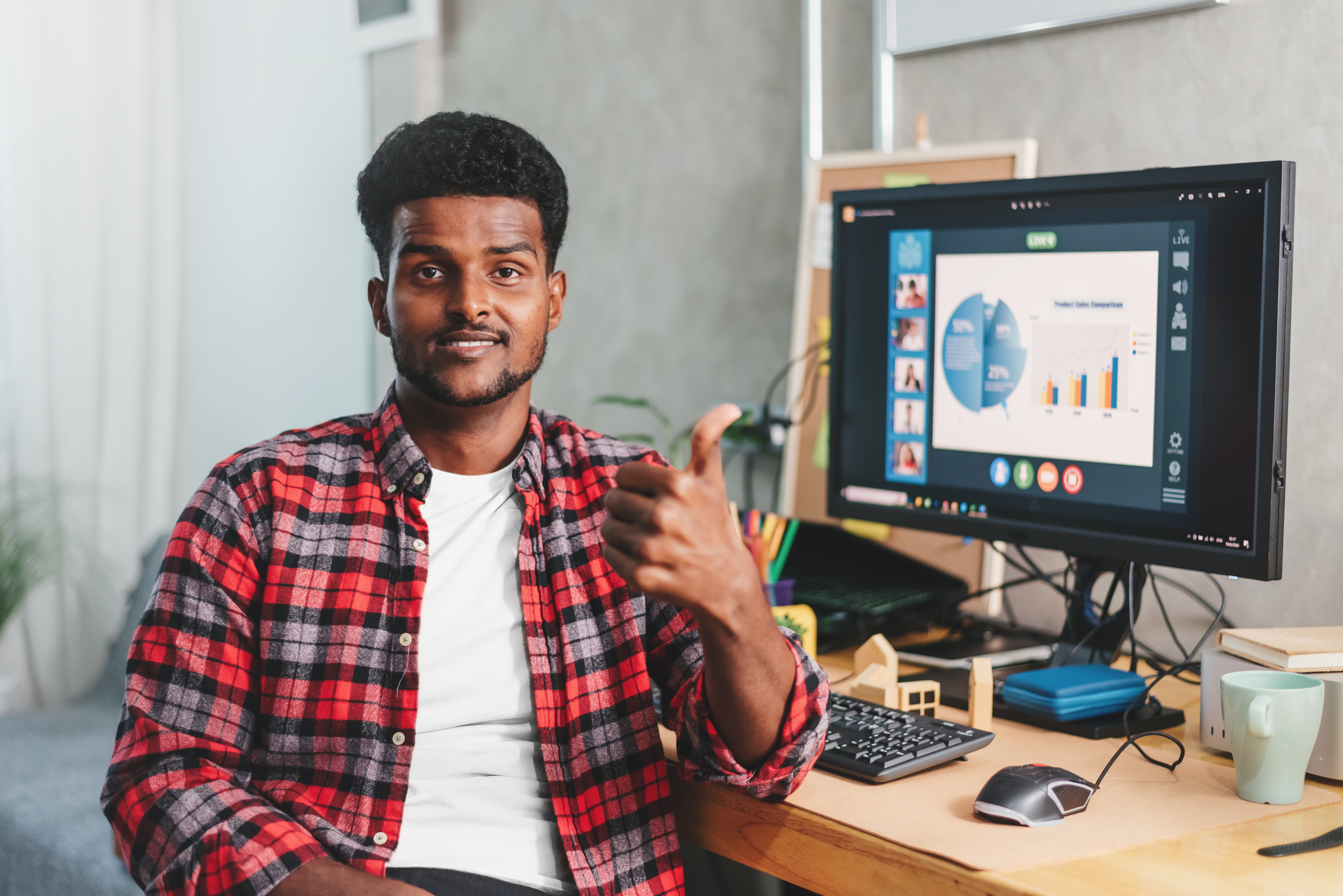 african-american-young-man-work-home-showing-thumb-up-good-work-background-working-desk