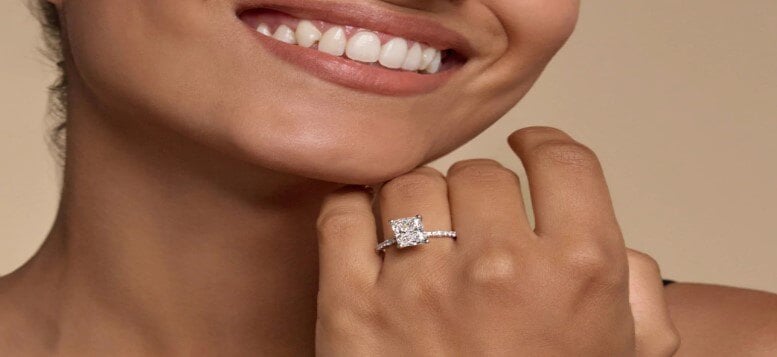 close up woman wearing lab grown diamond ring