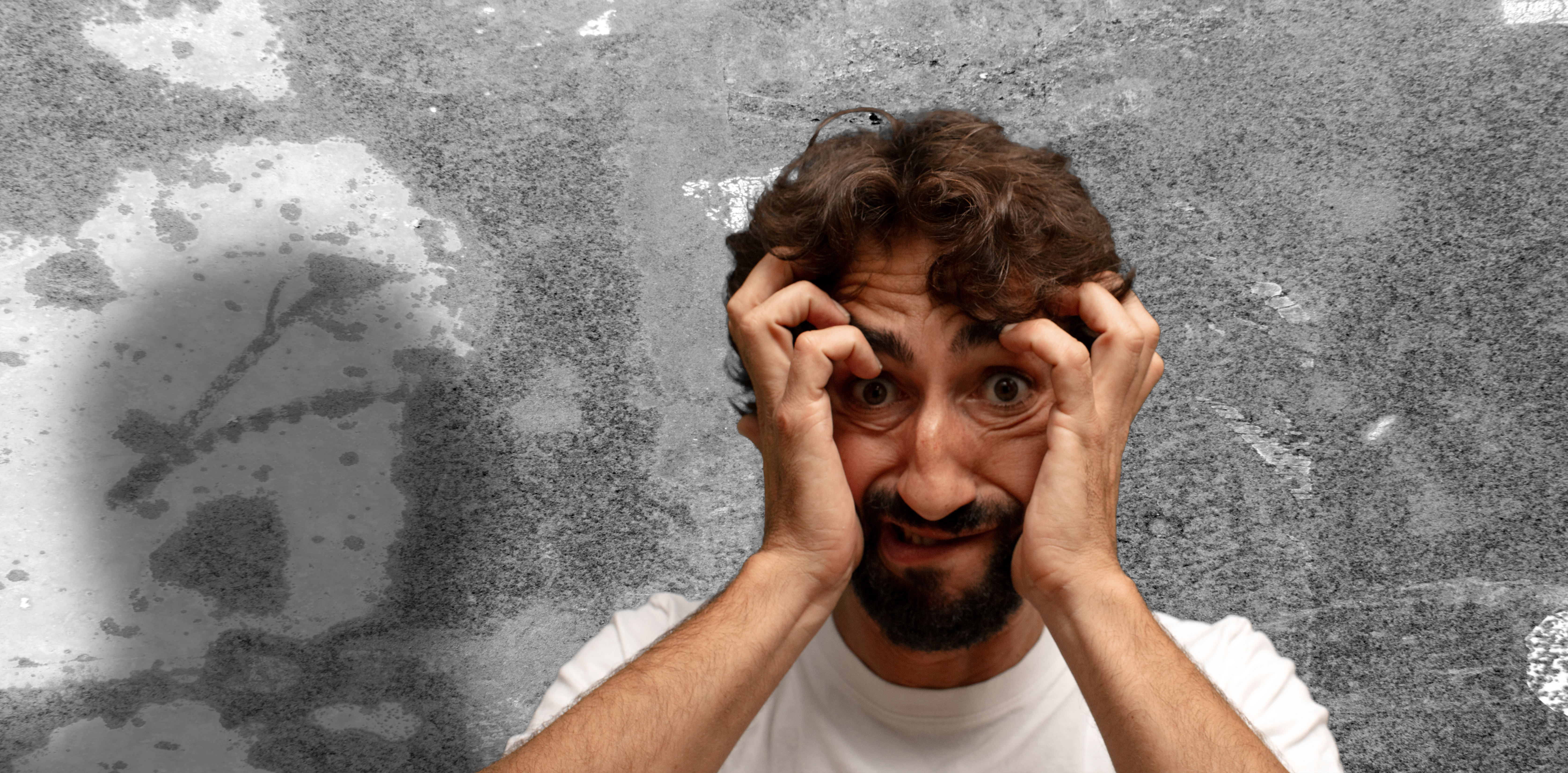 Feeling stressed worried anxious or scared with hands on head panicking at mistake