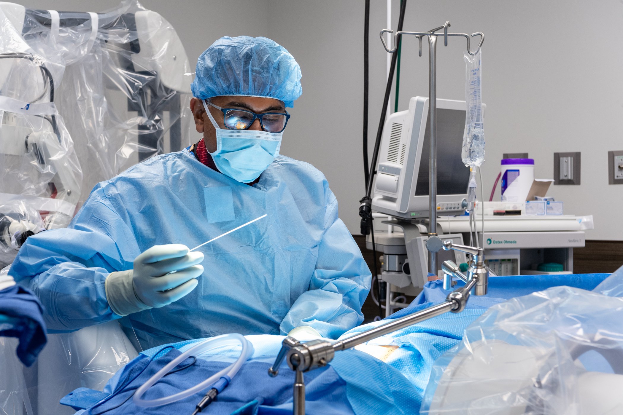 doctor operating for invasive spine surgery