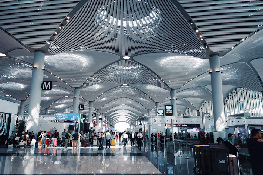 people walking inside airport during daytime