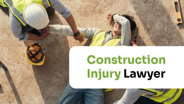 Text saying Construction Injury Lawyer over a Photo of injured person being helped by another on a construction site both in high vis vests