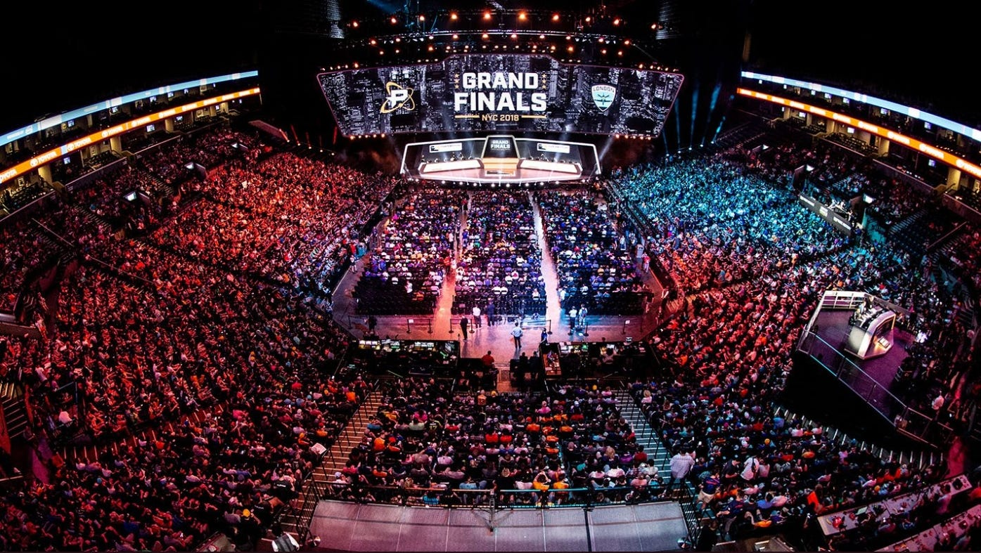 stadium full of people watching online gaming