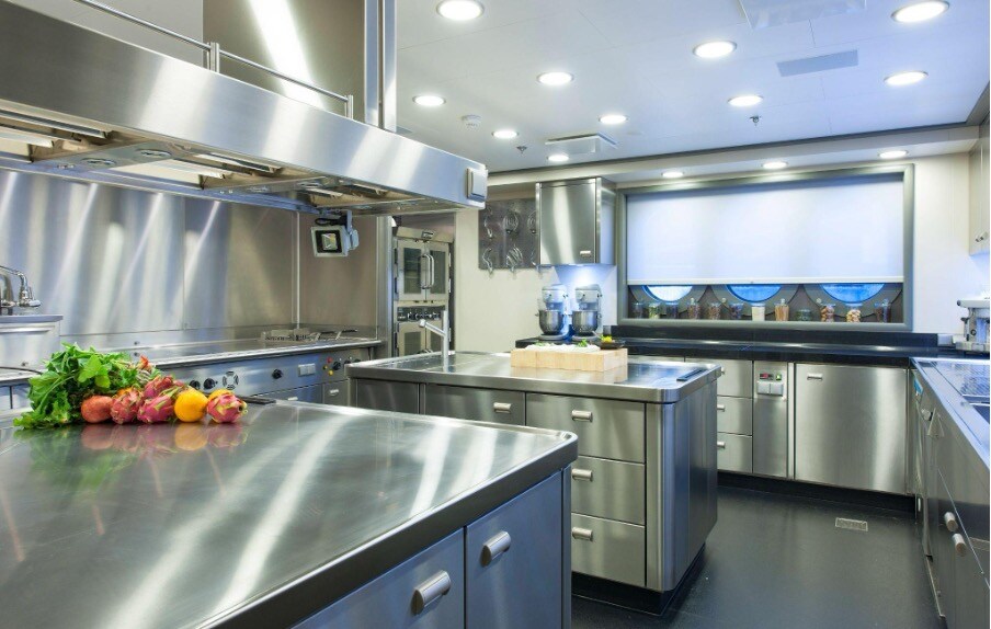 Photo of large modern kitchen featuring stainless steel