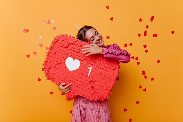 a woman smiling while hugging a comment