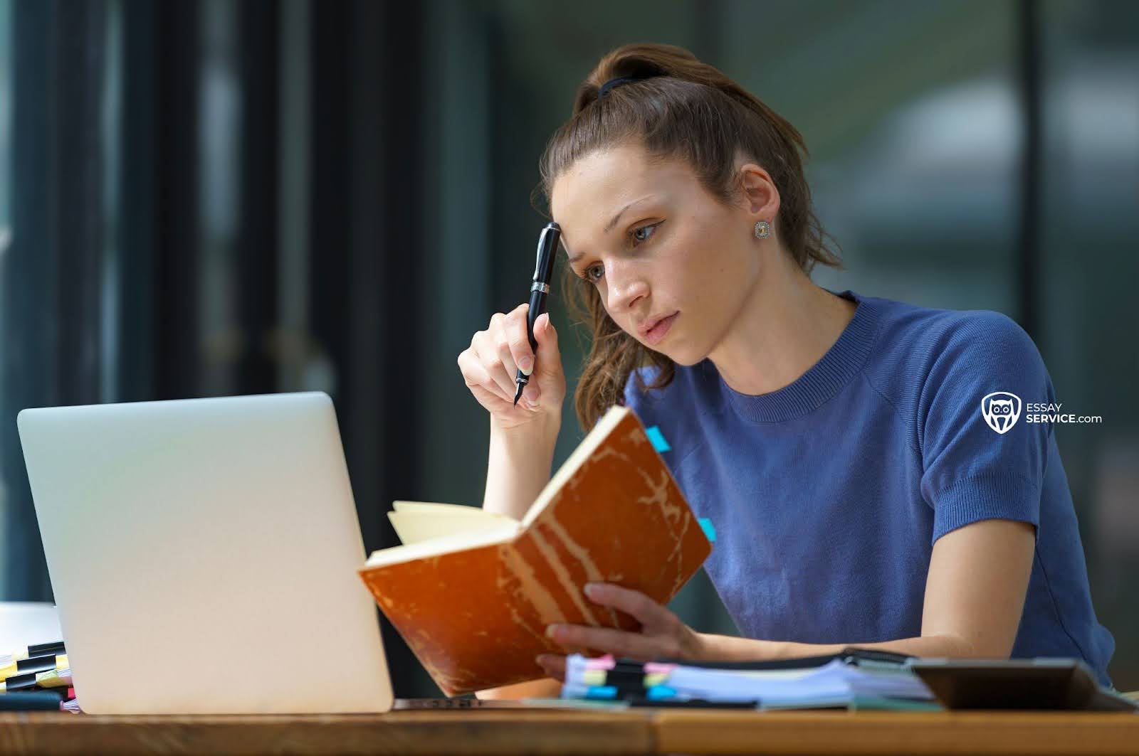 Women working and thinking with a pen against her head