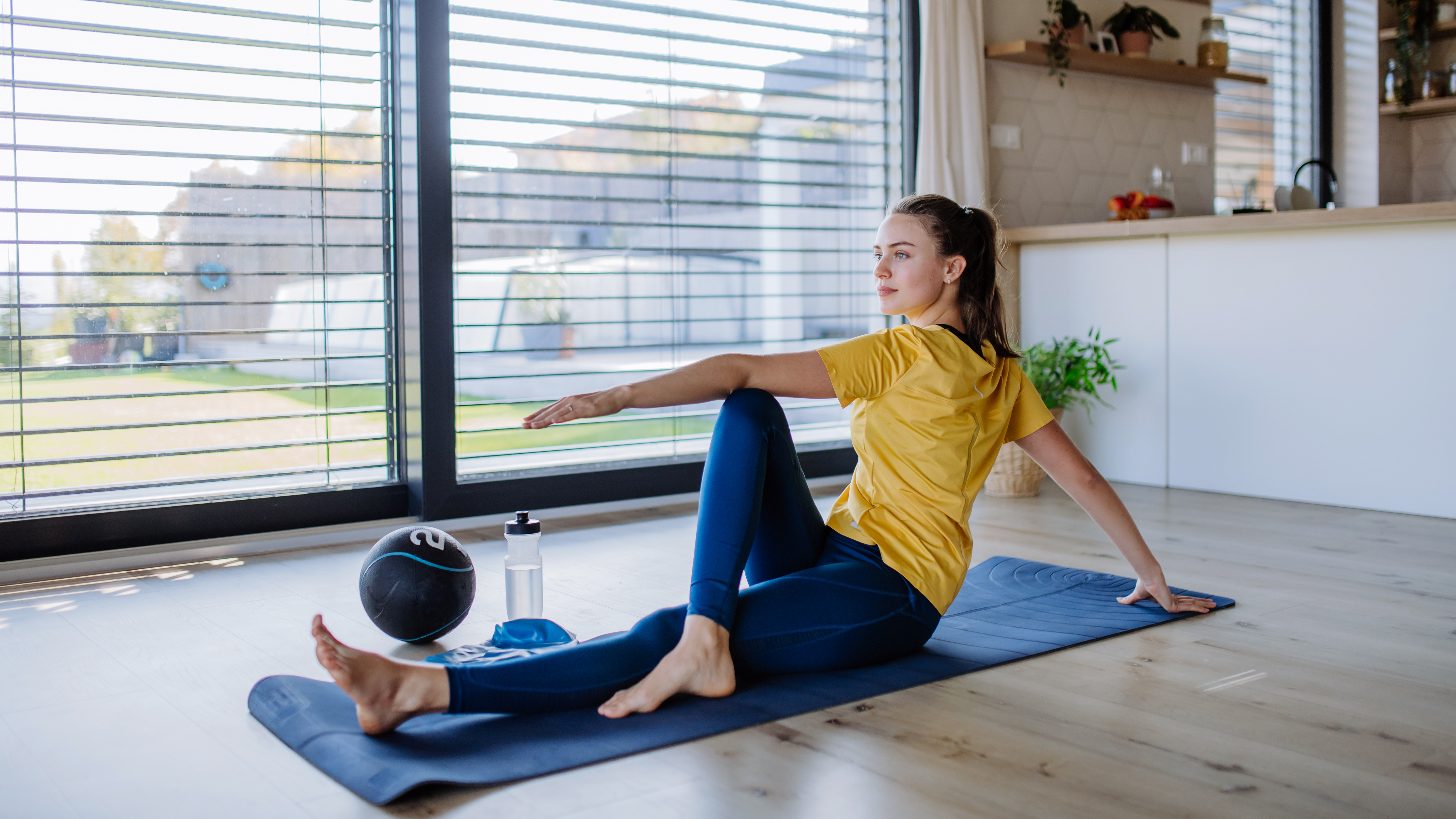 young-woman-doing-exercises-at-home